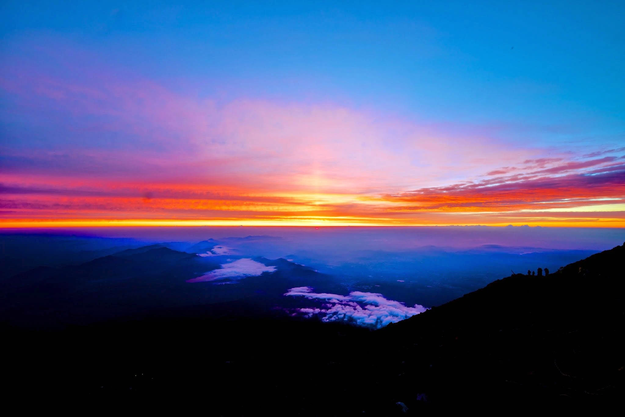 Mount Fuji Sunrise Above the Clouds