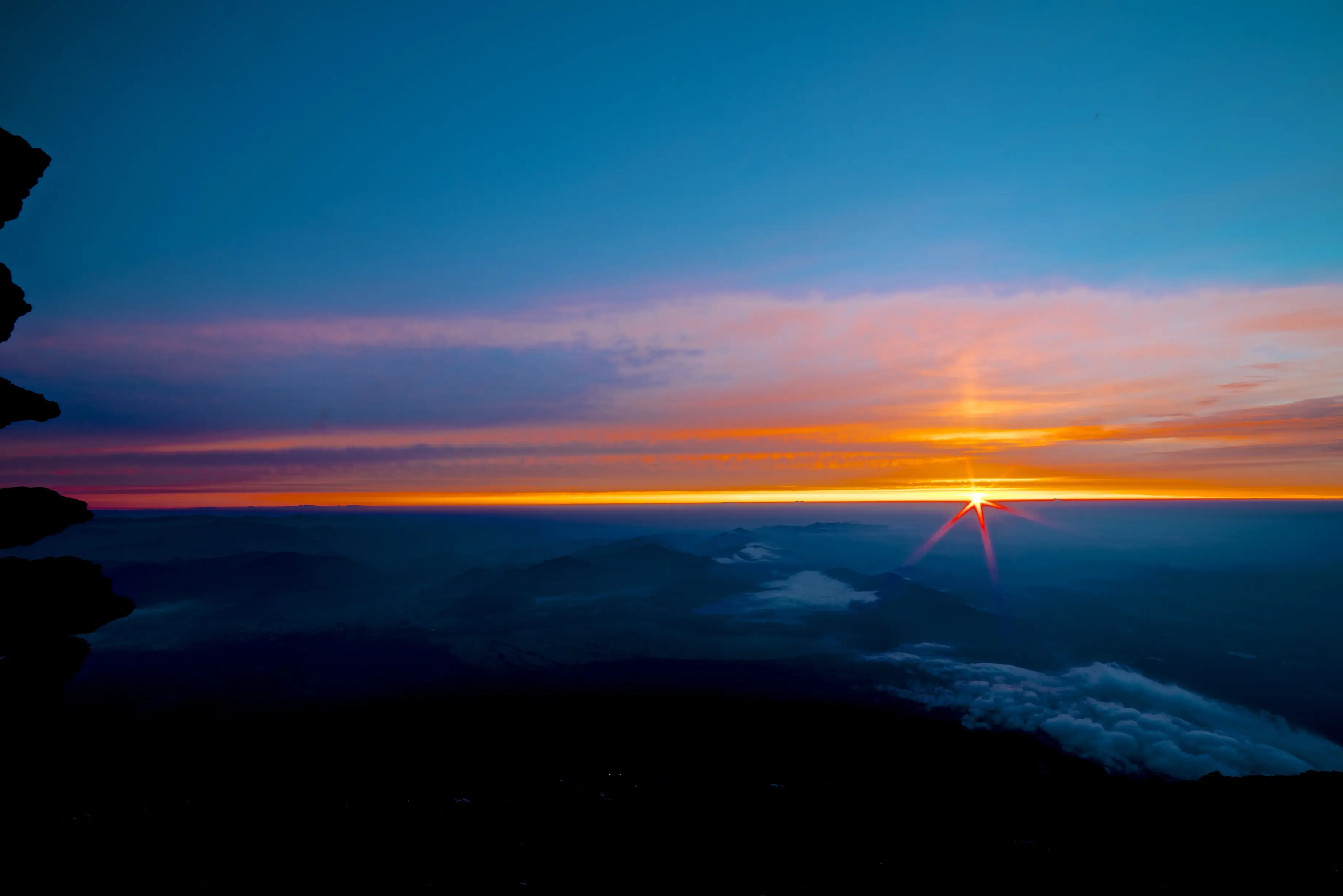 Mount Fuji Sunrise Above the Clouds